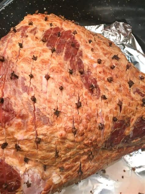 Brush 1/3 of glaze over the ham, and then tightly wrap it in the foil. Baked Ham with Brown Sugar Glaze | Recipe | Baked ham ...
