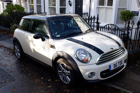 White Mini Cooper With Black Roof And Black Stripes On Bonnet Editorial
