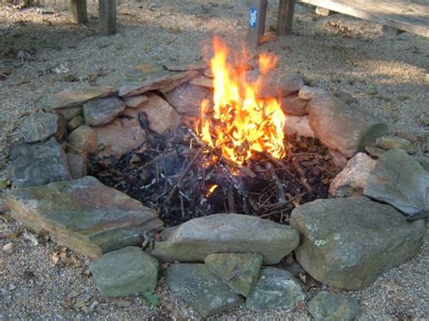 Seating more than 16 people comfortably, this fire pit is constructed from a breeze block frame with. How to Build a Fieldstone Fire Pit in 2020 | Backyard fire ...