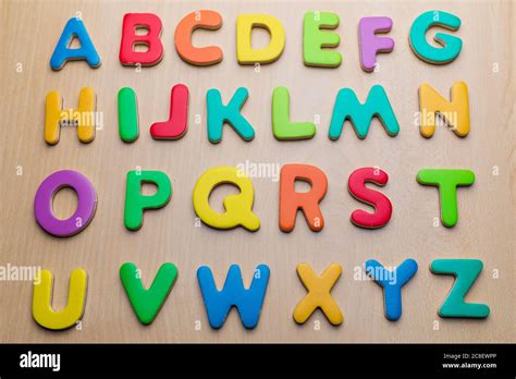 Colorful Letters On Wooden Background Alphabetical Order Top View