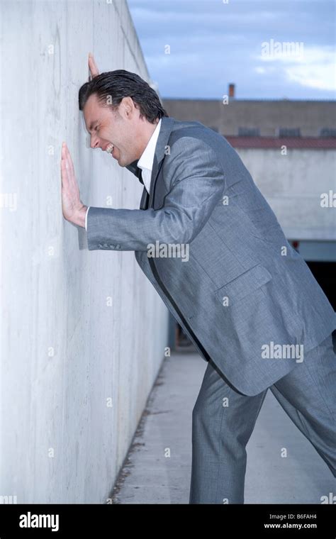 Banging Head Against Wall Hi Res Stock Photography And Images Alamy