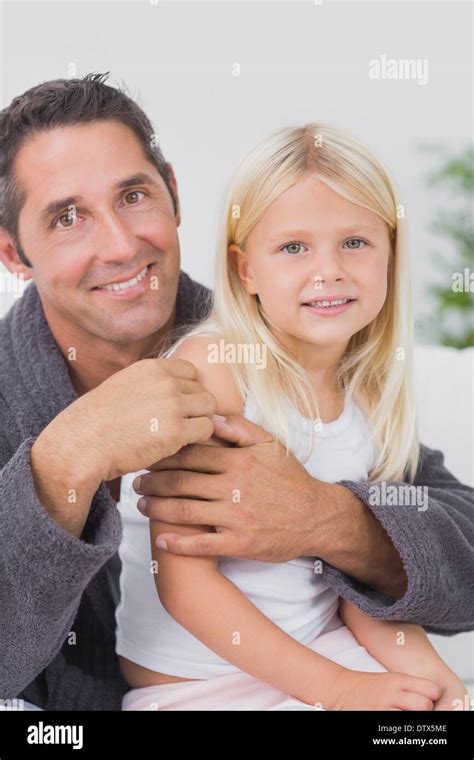 Smiling Father Hugging His Daughter Stock Photo Alamy