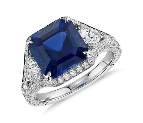 A Magnificent Emerald Cut Sapphire And Diamond Halo Ring In K White Gold Sensual Sapphires