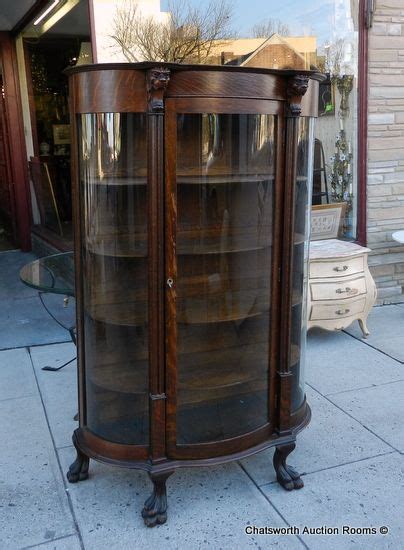 See more ideas about curio cabinet, antique curio cabinet, cabinet. Antique Victorian Keystone Quartered Oak Curved Glass ...