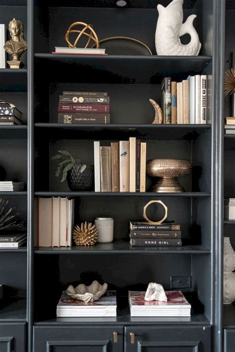 Use wallpapers and paint your wall: Inspiration Styling Bookshelf Ideas 23 - DECOREDO