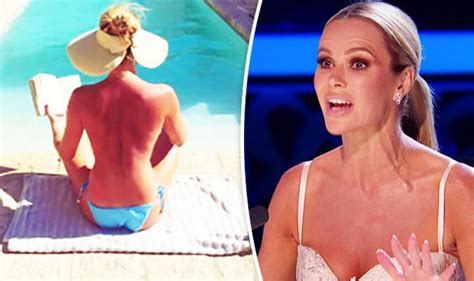 Amanda Holden Poses Topless As She Flashes The Flesh In