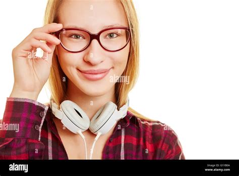 Smiling Girl With Her Hand On Her Glasses Stock Photo Alamy