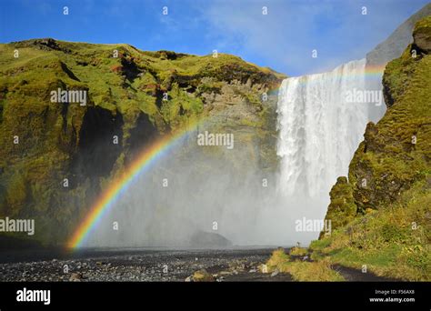 Skogafoss Waterfall With A Rainbow Skogar South Iceland Stock Photo