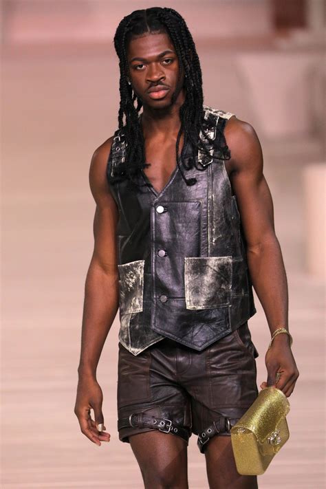 lil nas x is unrecognizable on the nyfw runway with his long new braids — see photo allure