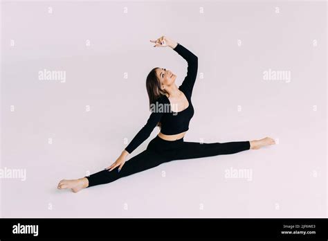 Fitness Woman Leg Split On White Background Stock Photo Alamy