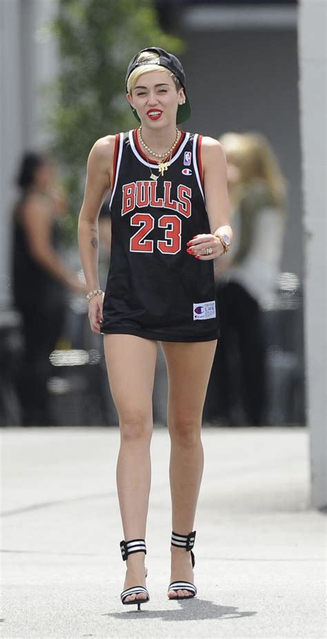 Miley Cyrus’ Sexy Bulls Jersey Style — Struts Around In Short Shorts Hollywood Life