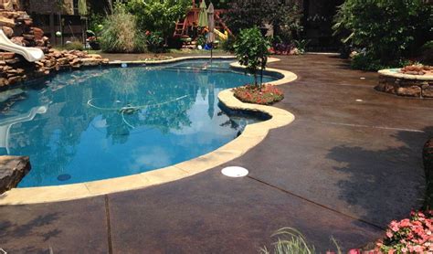 Stained Concrete Pool Deck And Play Area Concrete Pool Backyard Pool