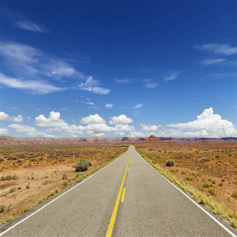 Two Lane Highway Through Desert Stock Photos Image 12960403