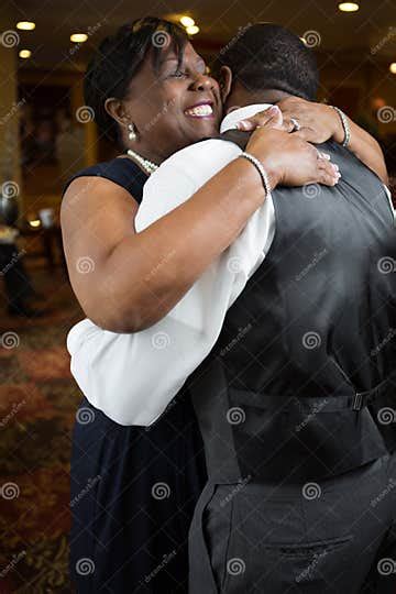Mother And Hugging Her Adult Son At His Wedding Stock Image Image Of