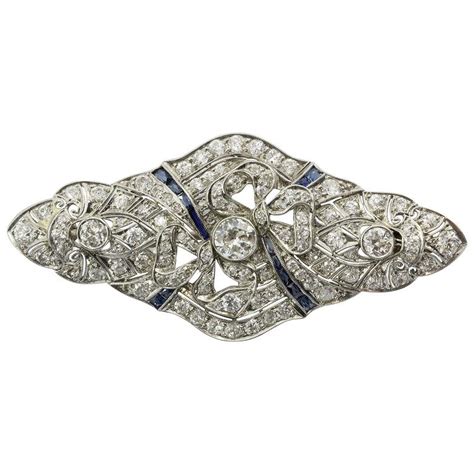 Edwardian Sapphire Diamond And Platinum Bow Pendant Brooch Circa 1900s
