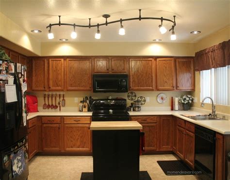One, creating a larger pool of light. Kitchen After -- great lighting! | Kitchen ceiling ...