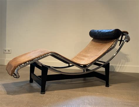During the chair's presentation, charlotte perriand posed for the famous. Le Corbusier for Cassina LC4 ponyskin chaise longue lounge ...