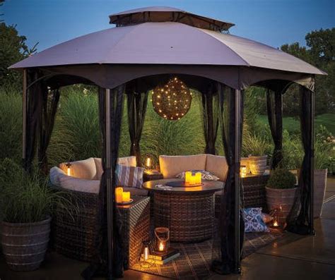 The black metal frame of the table contrasts nicely with the painted triangles and grounds the bright colors. Wilson & Fisher Manhattan Faux Rattan Battery-Operated ...