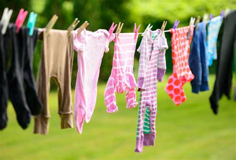 Clothes Hanging On Line In Garden Stock Photo Image Of Baby Drying