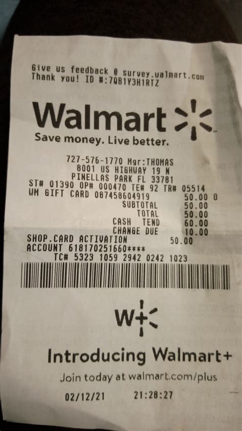 A Walmart Receipt Sitting On Top Of A Table