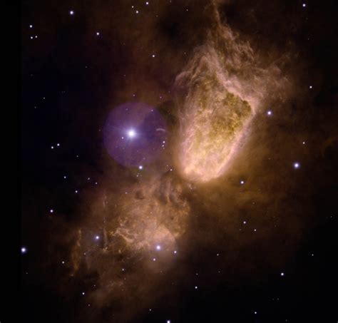Massive Star Blows Fancy Hourglass Nebula Wired