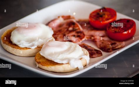 A Healthy English Breakfast 2 Poached Eggs On Muffins With Grilled