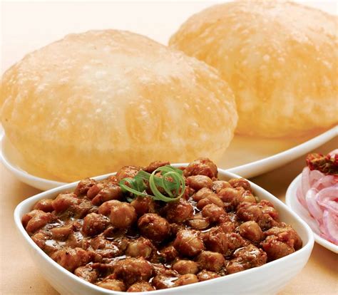 Punjabi dish, indian food, chole bhature recipe. Best Chole Bhature Places In Delhi That Will Win You Over With Flavour | Curly Tales