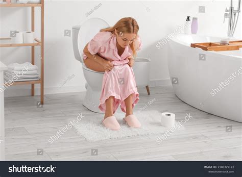 Mature Woman Diarrhea Sitting On Toilet Stock Photo 2180329123