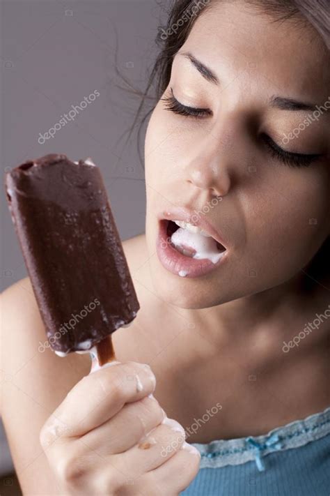 Sexy Brunette Woman Licking Chocolate Ice Cream Stock Photo By Rvas