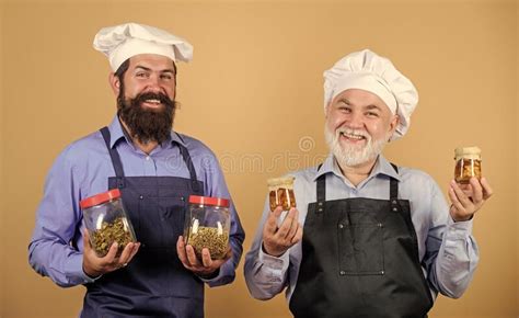 Choose A Healthy Lifestyle Mature Senior Bearded Men In Kitchen Chef Men Cooking Stock Image