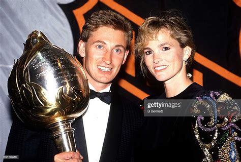 Wayne Gretzky Of The Los Angeles Kings Stands With His