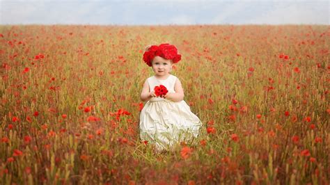 Download 1920x1080 Wallpaper Cute Baby Girl In Poppy Field Full Hd