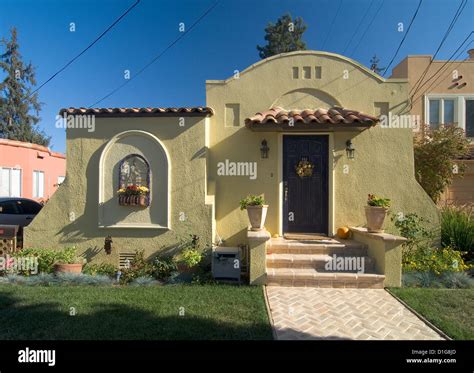 Front Exterior One Story Spanish Style House With Potted Plants San
