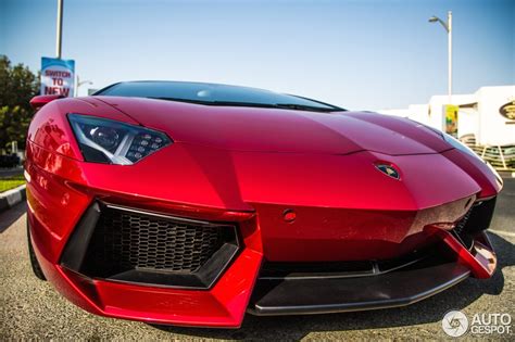 This hd wallpaper is about red lamborghini aventador, london, sport car, lamborgini, transportation, original wallpaper dimensions is 5463x1960px, file size is 656.43kb. Shimmering Beauty: Candy Red Lamborghini Aventador Roadster
