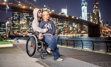 taylor morris a navy veteran and quadruple amputee sits with his girlfriend danielle kelly in