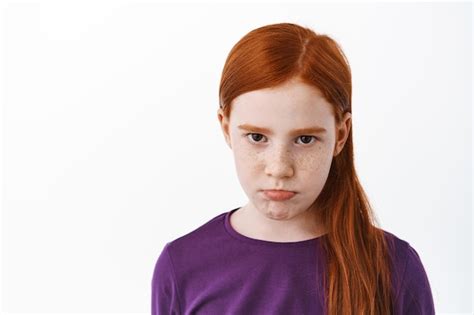 Free Photo Close Up Of Sad Redhead Girl With Freckles Sulking Angry