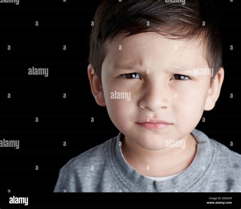 Kid Scowling Hi Res Stock Photography And Images Alamy