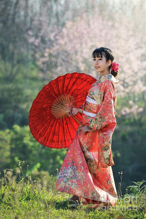 Attractive Asian Woman Wearing Traditional Japanese Kimono Photograph
