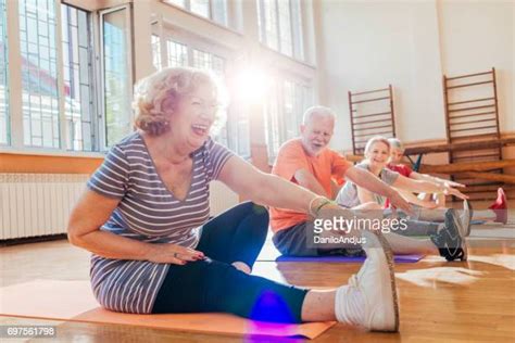 Mature Woman Warrior Pose Photos And Premium High Res Pictures Getty Images