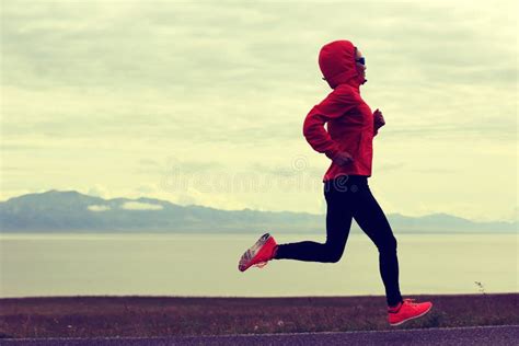Woman Runner Running On Sunrise Seaside Trail Stock Photo Image Of