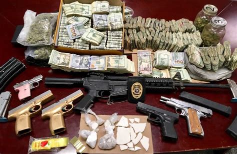 Drugs Guns And Cash Seized By Police After Search Warrant