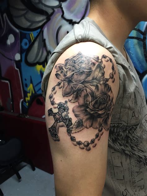 Amazing 3d rosary tattoo on hand. Rose With Rosary Tattoo
