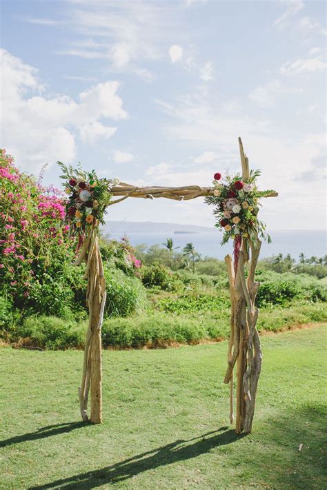 Two Post Driftwood Wedding Arch With Corner Floral Arrangements Maui