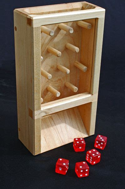 Each side of the dice (die) is a different color and there is a corresponding set of blocks in each color. Dice Tower for fair rolling handmade wooden | Dice tower, Wood games, Woodworking projects