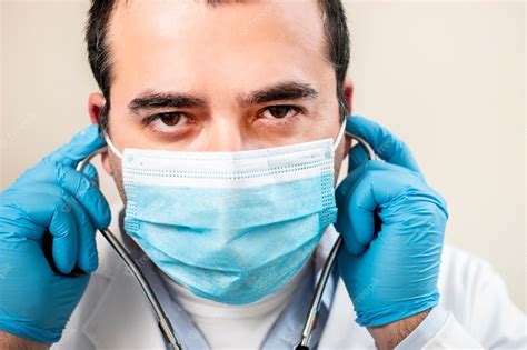 premium photo caucasian doctor with stethoscope and face mask