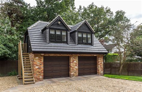 Traditional Double Garage With Room In Loft Space Matching Brick