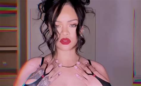 rihanna drops massive cleavage thirst traps rocking black lace and leather lingerie while