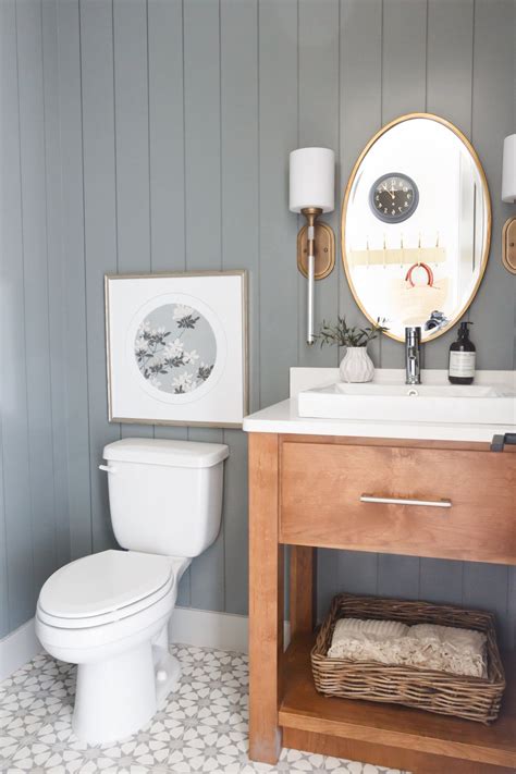 We're sharing beautiful bathrooms today that all pair warm wood vanities in golden tones with crisp white walls and marble. The Views Home | Modern farmhouse bathroom, Bathroom ...