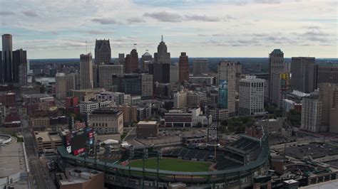 5 7k stock footage aerial video of approaching comerica park baseball stadium and skyline