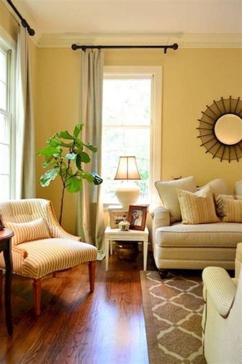 Decorating with yellow walls in a living room is one way to bring instant cheer. Creative Lighting Decor Ideas For Living Room Design 13 in 2019 | Yellow walls living room ...